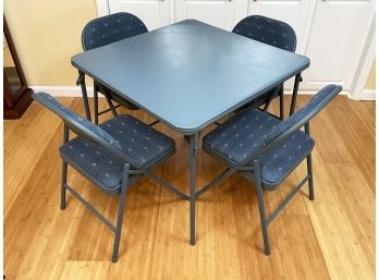 A Folding Card Table And Set Of 4 Chairs