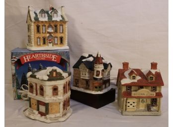 Collection Of Four Porcelain Lighted Christmas Houses