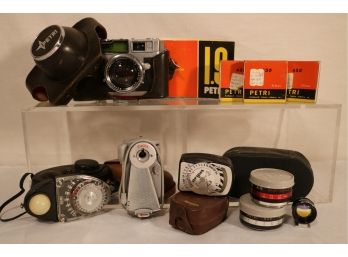 Petri 35mm Camera With Two Additional Lenses & Three Assorted Light Meters
