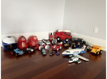 Collection Of Toy Cars, Airplanes, Helmets And More