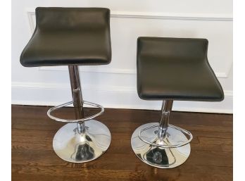 Two Contemporary Adjustable Height Chrome And Black Bar Stools