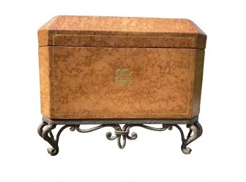 Burled Finish Keepsake Box With Gold Leaf Detail And Decorative Iron Display Base