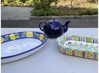 Bundle Of Colorful Painted Pottery Platters And Teapot