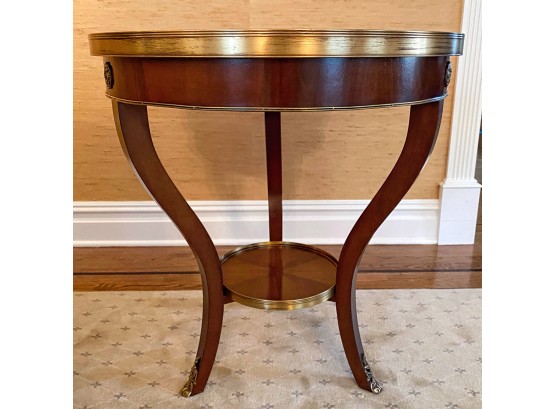 Round Accent Table With Antique Brass Medallion Detail And Cabriole Legs