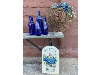 Assorted Blue Bottles And Decor