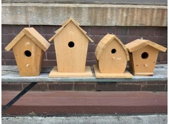 Four Unpainted Wooden Birdhouses