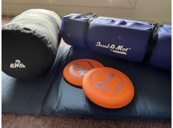 Camping Gear. EMS Sleeping Bag, Insul-a-mat, Therm-a-rest Self Inflating Mattress And 2 Frisbees