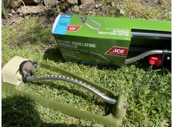 Two Oscillating Sprinklers One New In  Box