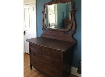 Antique Solid Wooden Dresser With Attached Beautifully Carved Mirror On Wheels