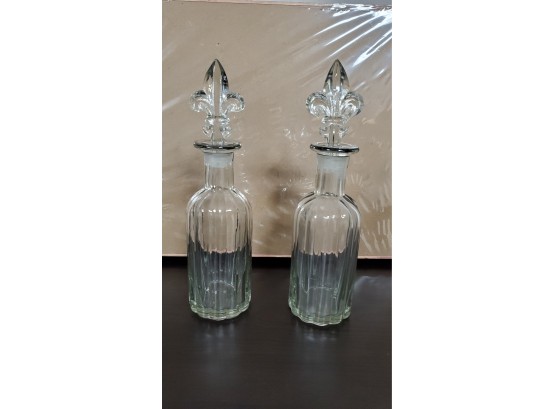 Two Vintage Clear Glass Decanters With Fleur De Lis Stoppers
