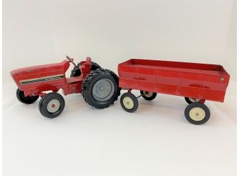 The Ertl Co. Red Tractor & Trailer