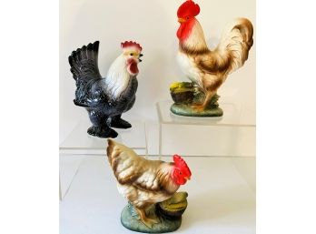 Three Ceramic Roosters: 2 Marked Japan One Unmarked: Smallest Rooster Is 5 In. H Others Are 7 In. Height