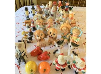 Lot Of Twenty-two Vintage Salt And Pepper Shakers Including Very Old Mickey Mouse, JFK On A Rocking Chair, Etc