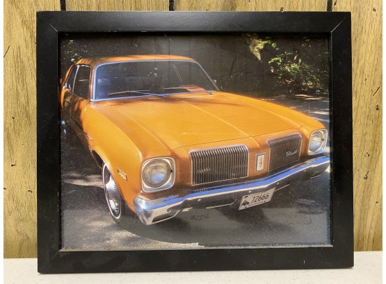 A Framed Photograph Of A Well-Loved Car