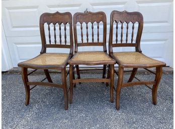 Three Vintage Caned-Seat Chairs