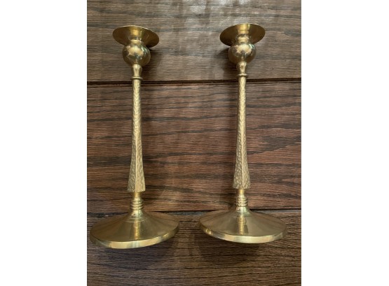 Pair Of Antique Hammered Brass Candlesticks
