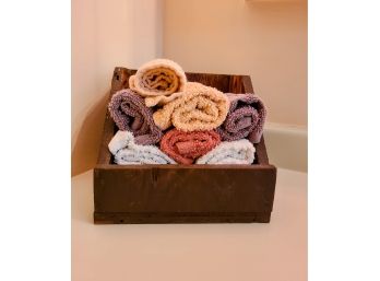 Brown Wooden Hand Towel Holder With Assorted Hand Towels