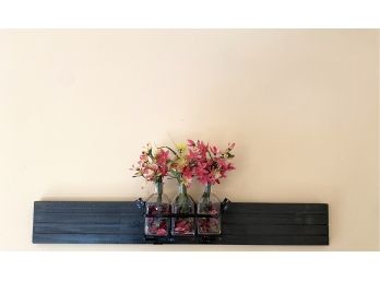 Triple Glass Bottle With Small Silk Flowers On Wood Slat Wall Decor