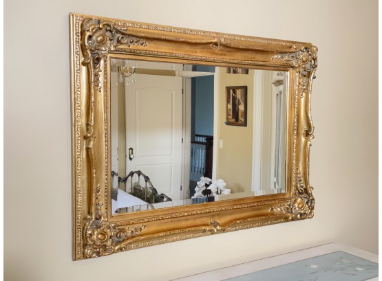 A Large Ornate Mirror In Gilt Wood Frame