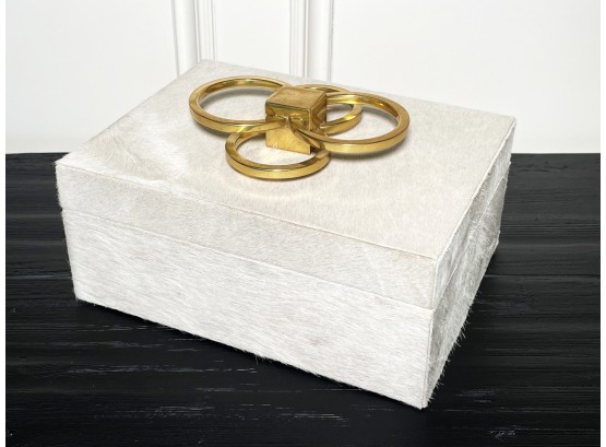 A Cowskin And Brass Jewelry Box