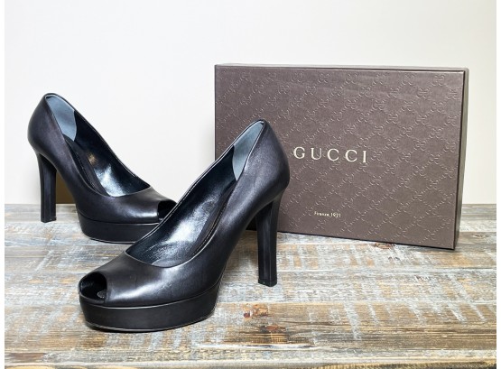 A Pair Of Ladies' Heels By Gucci
