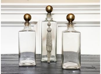 A Trio Of Hand-Blown Glass Bottles