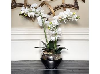 A Faux Orchid In Modern Planter