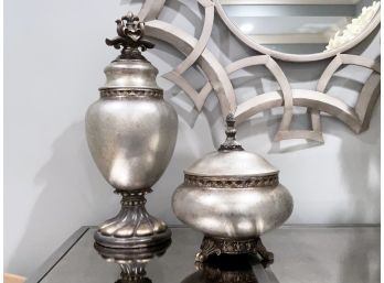 A Pair Of Polished Alloy Lidded Vases