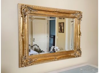 A Large Ornate Mirror In Gilt Wood Frame