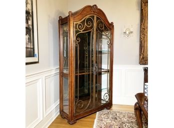 An Elegant Vitrine Cabinet With Metal Doors By Henredon