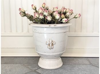 A Vintage Ceramic Urn With Faux Floral