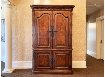 A Carved Hardwood Armoire By Henredon Furniture