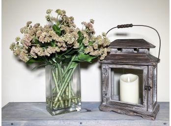 A Lantern And Floral Decor