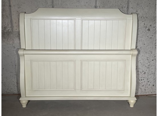 A Painted And Paneled Wood Queen Size Sleigh Bedstead