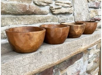 A Set Of Four Wooden Bowls From Pottery Barn