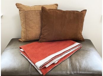 A Wool And Linen Accent Throw And Pillows