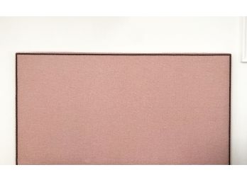 A Custom Queen Upholstered Headboard In Red Twill With Nailhead Trim By Ralph Lauren