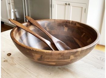 A Large Salad Bowl And Utensils By Williams-Sonoma