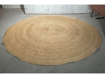 A Modern Round Natural Woven Area Rug