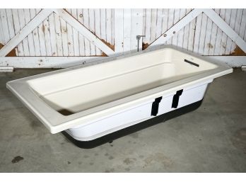 A NEW Kohler Bath Tub (specs Included)