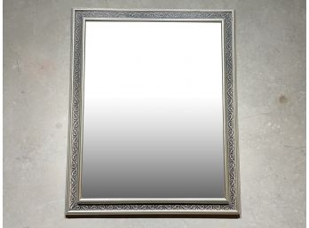 A Decorative Silver Framed Mirror