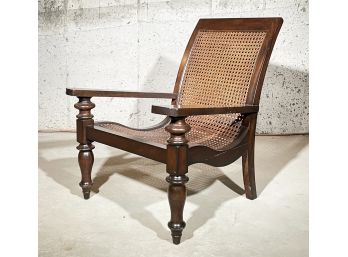 A Large Caned Steamer Chair