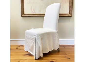 A Camelback Chair By Restoration Hardware With Linen Slipcover