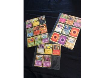 Lot Of 23 Assorted Pokemon Cards In Sheets With Foil Charizard