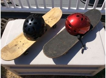 2 Skateboards With 2 Razor Helmets