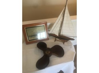 Three Nautical Items: Boat Propeller Clock, Model Sailing Boat, And Antique Framed Picture 'Royal Yacht'
