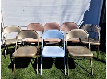 Eight Metal Folding Chairs