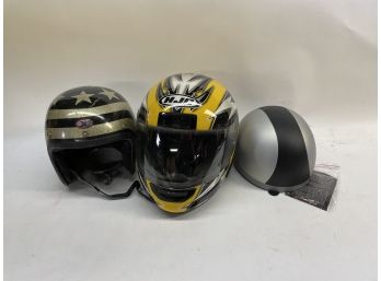 2 Motorcycle Helmets And One Bike Or Scooter Helmet