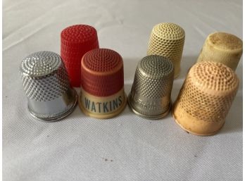 Thimbles With Different Company Names Of The Times They Were Made.