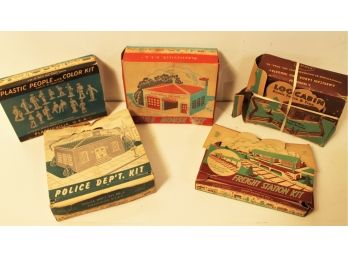 Vintage Lot Of Plasticville With Fire & Police Stations, Freight Station, Log Cabin & People, Etc.